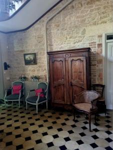 Posezení v ubytování Château des Charmes