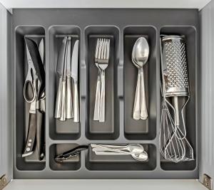 a tray with utensils in a drawer at Tenerifeopenhome Costa Adeje comfort apartment 3 pools in Adeje