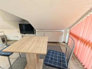 TV/Unterhaltungsangebot in der Unterkunft Ferienwohnung Am Fenn