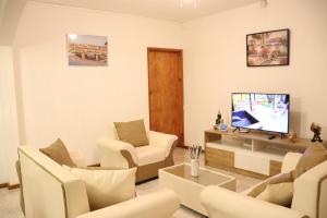 โทรทัศน์และ/หรือระบบความบันเทิงของ Mountain Panoramic Suite