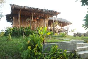 Ein Garten an der Unterkunft Phuree Hut