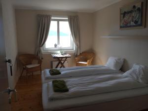 En eller flere senger på et rom på Hardanger Rom & Harmonium "The Green B&B"