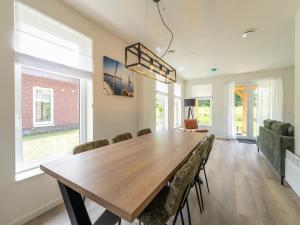 Χώρος καθιστικού στο Holiday Home by Lake Beach Simonshaven