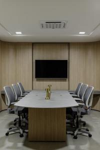 Área de negócios e/ou sala de conferências em HCM - Hotel Corais de Manaira
