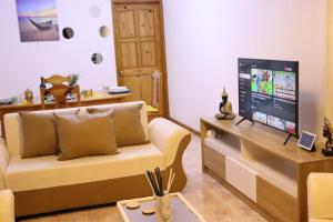 Телевізор і / або розважальний центр в Sunset view Suite