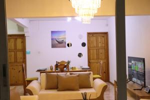 Телевізор і / або розважальний центр в Sunset view Suite