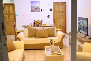 Телевізор і / або розважальний центр в Sunset view Suite