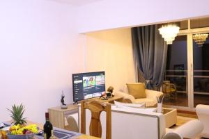 Телевізор і / або розважальний центр в Sunset view Suite