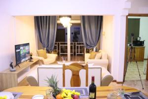 Телевізор і / або розважальний центр в Sunset view Suite