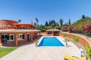 an image of a house with a swimming pool at Quinta da Falfeira in Lagos
