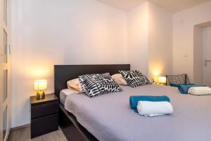 Postel nebo postele na pokoji v ubytování House STiKA
