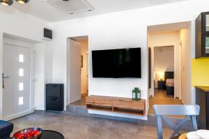 TV a/nebo společenská místnost v ubytování House STiKA