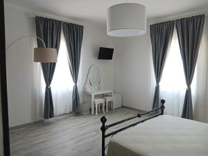 Postel nebo postele na pokoji v ubytování Euphoria Guest House