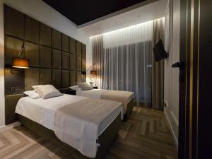 Ένα ή περισσότερα κρεβάτια σε δωμάτιο στο Hevenia apartament 19 +34 φωτογραφίες