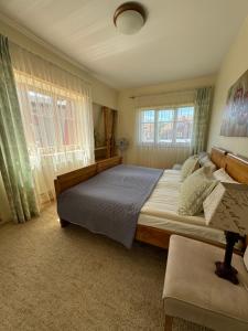Lova arba lovos apgyvendinimo įstaigoje Guest house ''8 Smilgos''