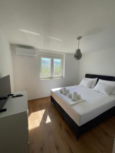 Ένα ή περισσότερα κρεβάτια σε δωμάτιο στο Residence Kelava