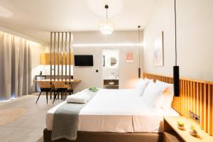 A bed or beds in a room at Petrichor