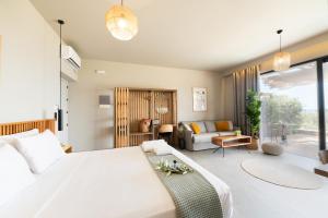 A bed or beds in a room at Petrichor