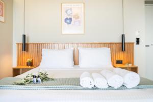 A bed or beds in a room at Petrichor