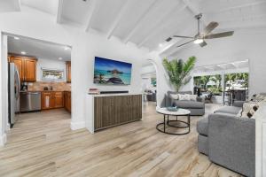 a living room with a couch and a table at The Riverside Retreat 2 in Fort Lauderdale