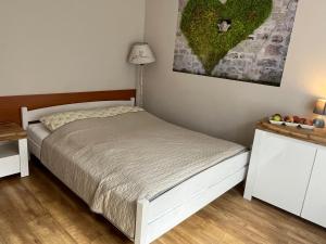 Postel nebo postele na pokoji v ubytování Pod Aniołami