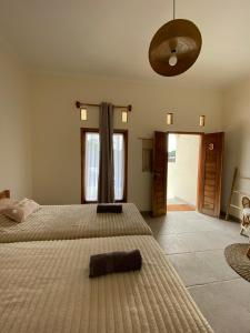 Ліжко або ліжка в номері Sastro Place