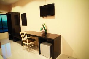 TV a/nebo společenská místnost v ubytování B-Cozy Hotel