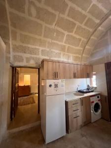 Kuchyň nebo kuchyňský kout v ubytování Uluyol Stone House