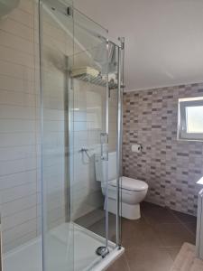 Koupelna v ubytování Adria apartmani + 37 fotografií