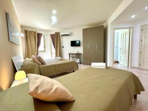 Postel nebo postele na pokoji v ubytování B&B Blue