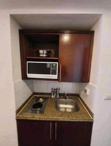 Η κουζίνα ή μικρή κουζίνα στο بورتو ثاوث بيتش