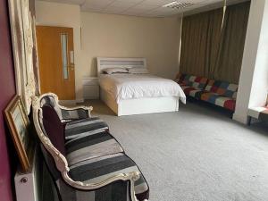 Ένα ή περισσότερα κρεβάτια σε δωμάτιο στο ART APARTMENT