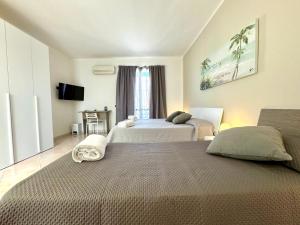 Postel nebo postele na pokoji v ubytování B&B Blue