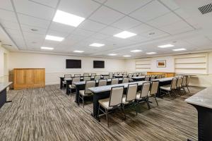 a conference room with rows of tables and chairs at Best Western Springfield Hotel in Springfield +37 photos