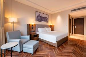Grand Mirage Dhanbad, a member of Radisson Individuals客房内的一张或多张床位
