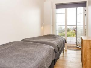 Postel nebo postele na pokoji v ubytování Apartment Ringkøbing CXXIII