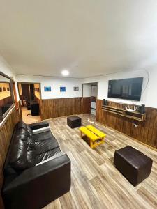 TV a/nebo společenská místnost v ubytování Hostel Rosa de los Vientos