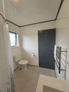 Koupelna v ubytování Greenwood Park Motel + 2 fotografie