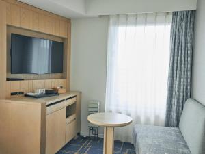 Kuchyň nebo kuchyňský kout v ubytování Hotel Traveltine Kyoto Kiyamachi