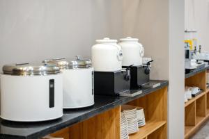 Příslušenství pro přípravu čaje a kávy v ubytování 天津欣得滨海塘沽店