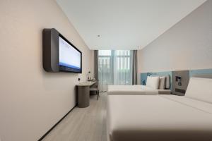 Camera con 2 Letti e TV a schermo piatto di Atour Light Hotel Wuxi Taihu Lake Expo Center Financial Street a Wuxi