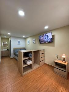 TV in/ali zabaviščno središče v nastanitvi Hostelfc Usaquen