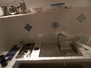 Η κουζίνα ή μικρή κουζίνα στο Casa Corte con Terrazza +20 φωτογραφίες