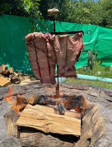 a piece of wood sitting on top of a log at Quinta Mi angel in La Reja