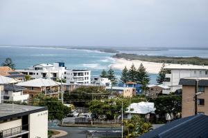 a view of a city with a beach and buildings at Kings Beach Coast and Glasshouse Views - A in Caloundra +38 photos