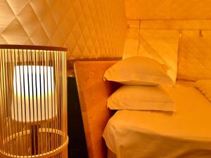 A bed or beds in a room at Zhangjiajie Cliff Flower RV Tent Hotel