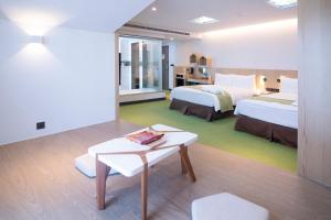 Postel nebo postele na pokoji v ubytování CHECK inn MAGI Kids Hotel
