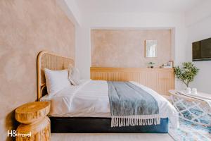 Postel nebo postele na pokoji v ubytování Apple Scent Stay + 26 fotografií