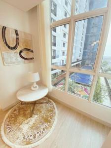 Fotografie z fotogalerie ubytování Pool View One Bedroom Apartment BSD with Kitchen v destinaci Dadap