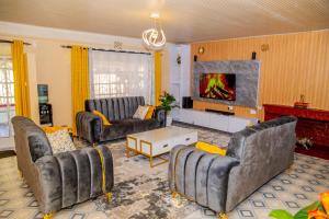 Posezení v ubytování Paradise cozy homes